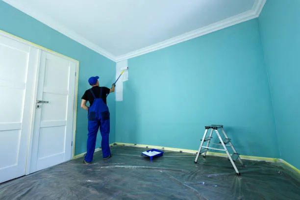 Professional interior house painting showing freshly painted walls and trim