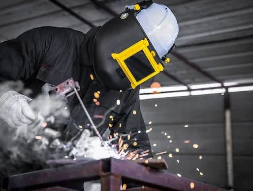 Professional welding work on metal framework and industrial fabrication